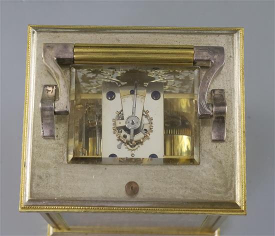 An early 20th century silvered and ormolu hour repeating carriage clock, H.6.25in.